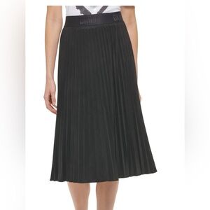 DKNY black  faux suede, pleaded skirt size medium